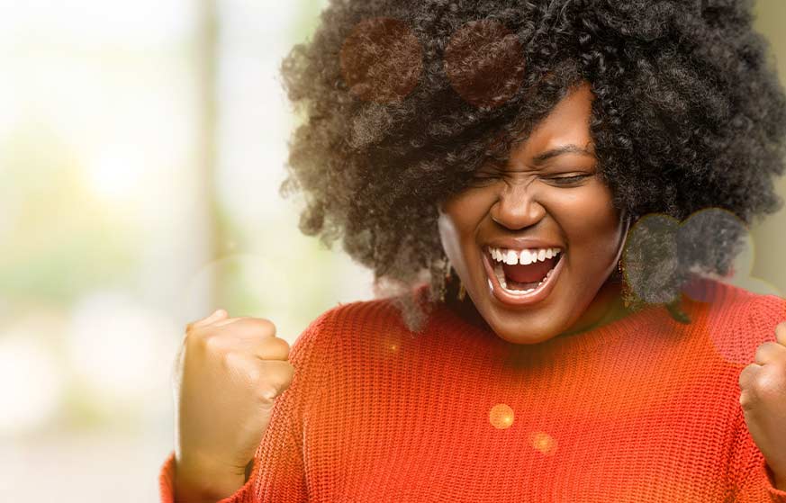 wccareers-image-womaninorangesweatercheering